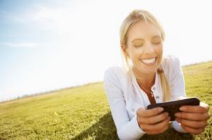 Woman Gambling on Mobile Phone
